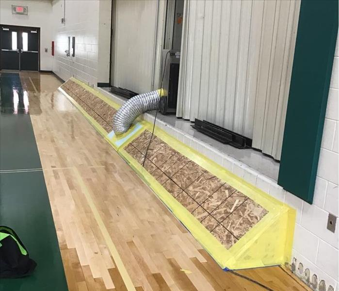 Here to Help - image of gym floor